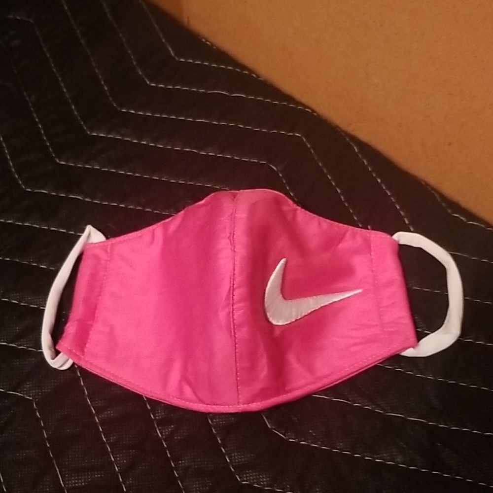 Childs  pink mask.